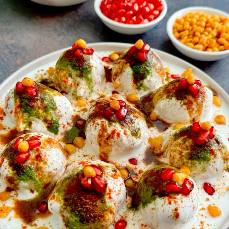 Indian papdi chaat topped with curd,chutney and spices